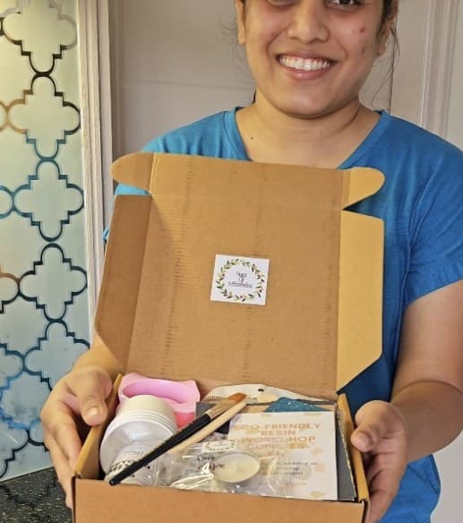 Swati Gupta holding an open Hues of Memories gift box
