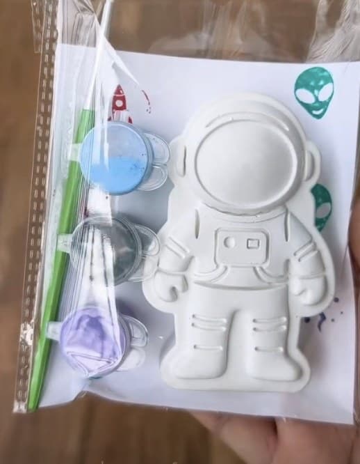 Astronaut painting kit with a plaster astronaut and paint pots