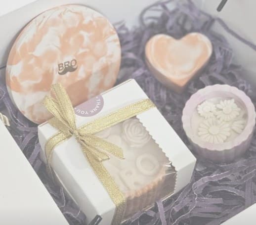 Rakhi hamper with a resin coaster, heart dish and a ribboned gift box